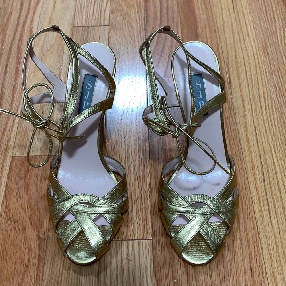 SJP gold heels with tie ankle